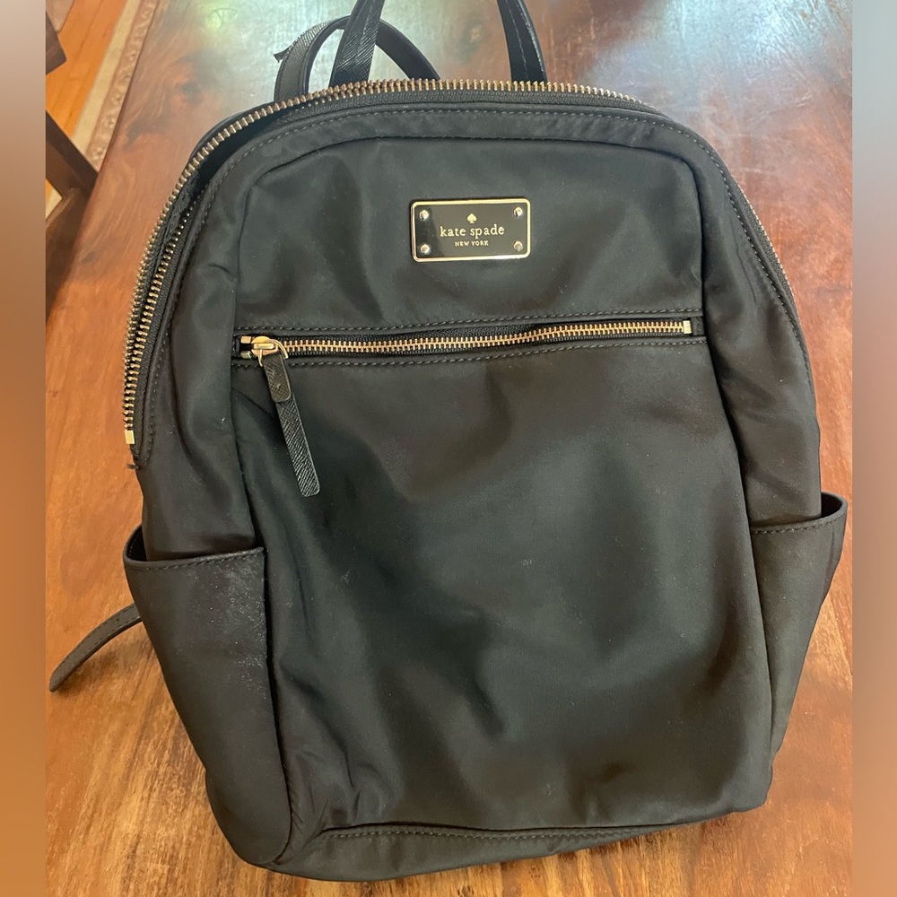 Kate Spade purse/backpack style. Small. Good condition, almost like new.